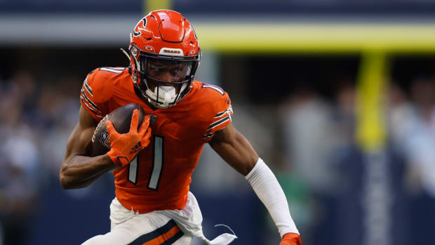 Oct 30, 2022; Arlington, Texas, USA; Chicago Bears wide receiver Darnell Mooney (11) runs for a first down in the third quarter against the Dallas Cowboys at AT&T Stadium.